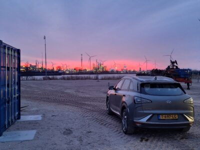 sunset over wind turbines